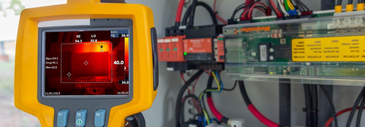 Thermoscan(thermal image camera), Industrial equipment used for checking the internal temperature of the machine for preventive maintenance, This is checking The power supply for tracking sun of solar plant.
